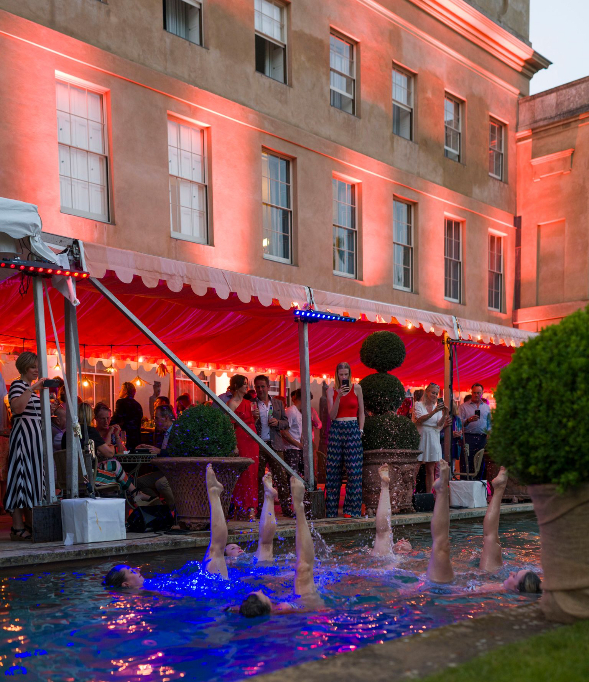 Aquabatix synchronised swimmers performing at Heveningham Concours